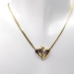 Gouden collier met diamant hart hanger
