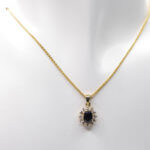 Gouden ketting met saffier hanger