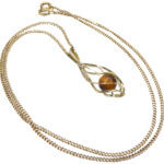 Gouden ketting met tijgeroog hanger