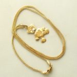 Gouden collier met teddybeer hanger