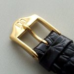 Gouden Monnard horloge met leren band