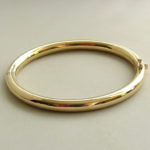 Geel gouden slavenarmband rond model