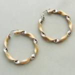 14 karaat bicolor gouden gedraaide oorbellen