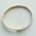 14 karaat bicolor slavenarmband halfrond model