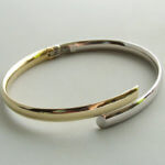 14 karaat bicolor slavenarmband halfrond model