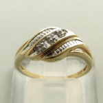 Gouden vlecht ring met diamant