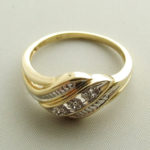 Gouden vlecht ring met diamant