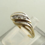 Gouden vlecht ring met diamant