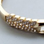 Christian gouden slavenarmband met zirkonia