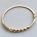 Christian gouden slavenarmband met zirkonia
