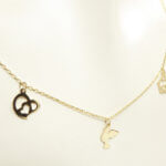 Gouden ketting met bedel hangers