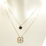 Gouden ketting met klaver hangers