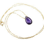 Gouden ketting met ovale amethist hanger