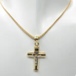 Bicolor gouden kruis met korpus