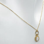 Geel gouden opaal hanger met ketting
