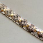 Bicolor Christian gouden armband