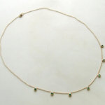 14 karaat gouden collier met smaragd