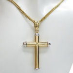 Geel en wit gouden kruis