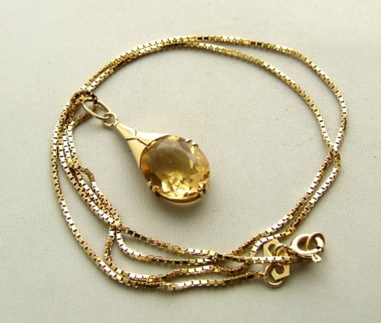 Gouden collier en hanger met citrien