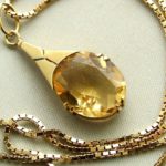 Gouden collier en hanger met citrien