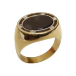 Gouden zegelring met onyx en diamanten