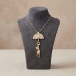 Gouden meisje met zirkonia paraplu hanger