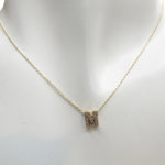 Gouden ketting met M zirkonia hanger