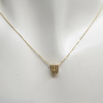 Gouden ketting met U zirkonia hanger