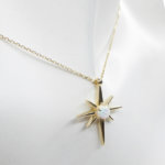 Geel gouden opaal ster hanger