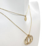 Gouden dubbele hangers en kettingen