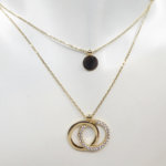 Gouden dubbele hangers en kettingen