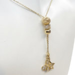 Gouden vlinder en ster hanger