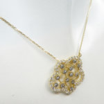 Gouden zirkonia roos hanger