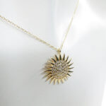 Gouden zirkonia zonnehanger