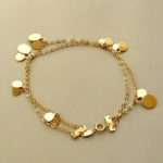 Gouden bedeltjes armband