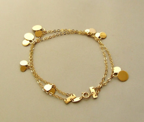 Gouden bedeltjes armband