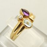 Gouden ring met topaas, amethist en briljant