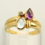 Gouden ring met topaas, amethist en briljant