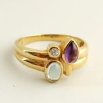 Gouden ring met topaas, amethist en briljant
