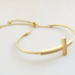 18 karaat gouden armband met kruis