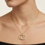 Gouden dubbele hangers en kettingen