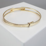 Bicolor gouden schanier armband