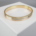 Christian gouden slavenarmband tricolor