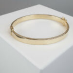 Geel gouden Christian 14 karaat slavenarmband