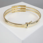 Geel gouden Christian schanier armband