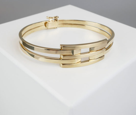 Geel gouden Christian schanier armband