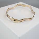 Gouden Christian slavenarmband golvend model