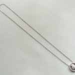 Gouden collier met diamanten harten hanger