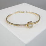 Gouden fantasie armband met zirkonia