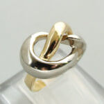 Gouden gevlochten bicolor ring